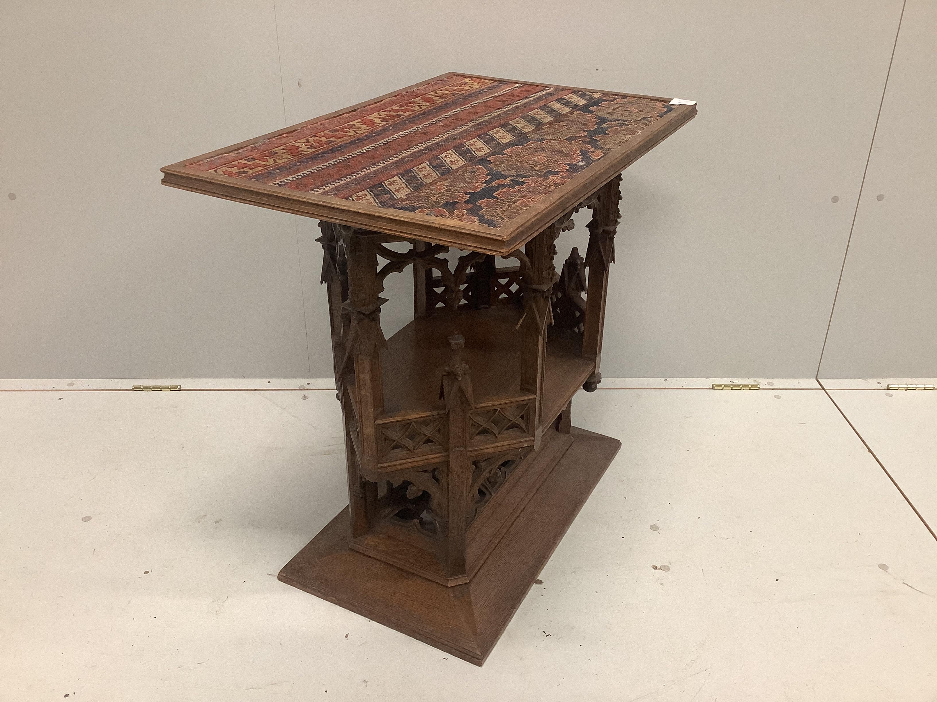A Victorian Pugin style oak occasional table with Kilim inset top, width 75cm, depth 50cm, height 72cm